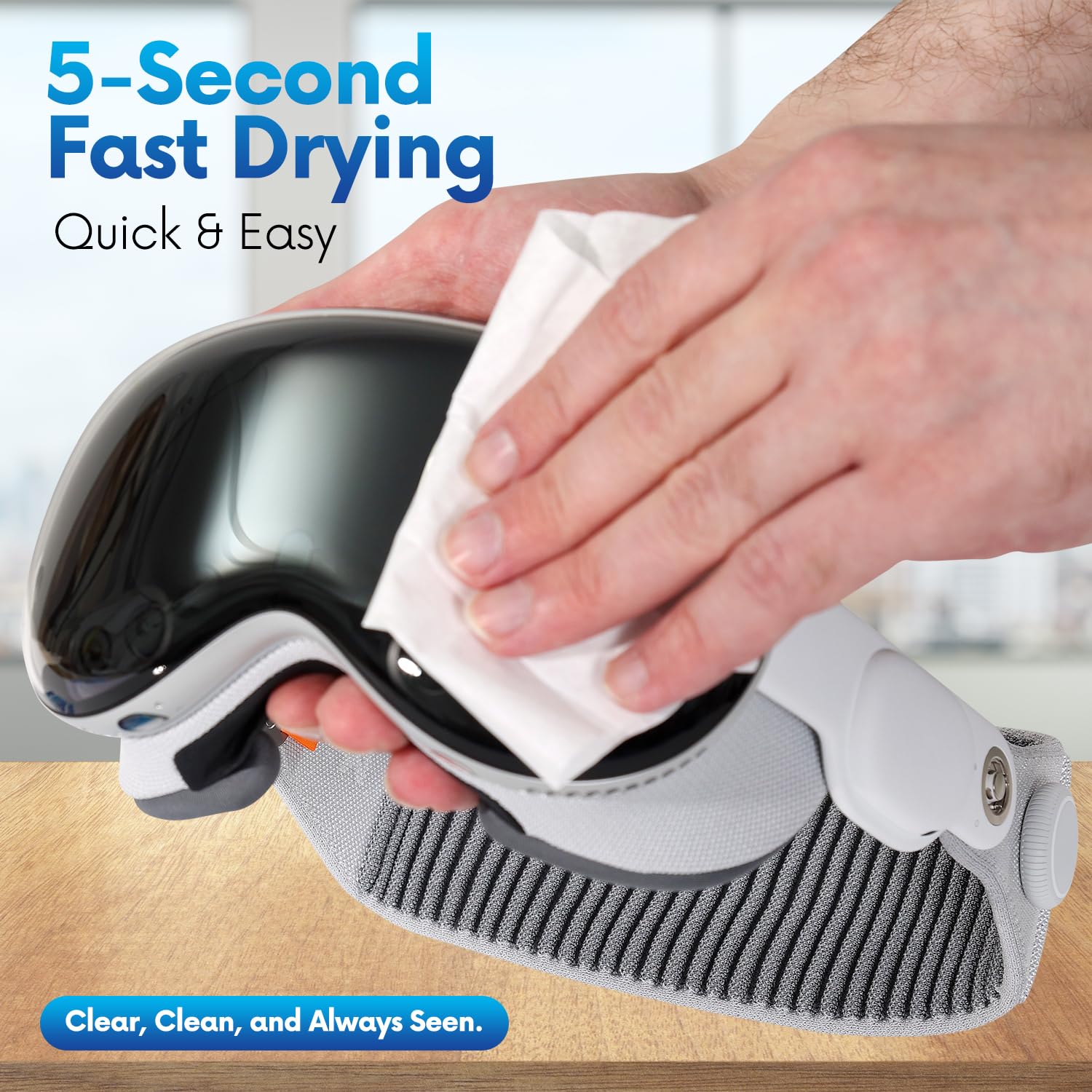 Close-up of wipe removing smudges from eyeglasses