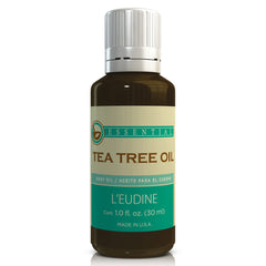 L’eudine Tea Tree Oil bottle closeup highlights purity for skincare and cleaning.