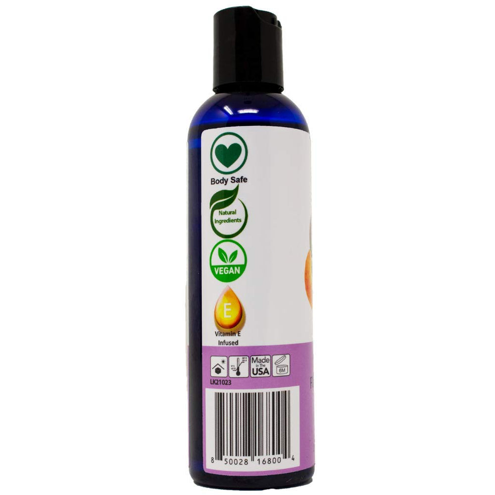 Close-up of flip-top cap on massage oil bottle