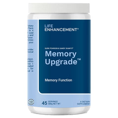 Life Enhancement Memory Upgrade product packaging beside a glass of citrus drink