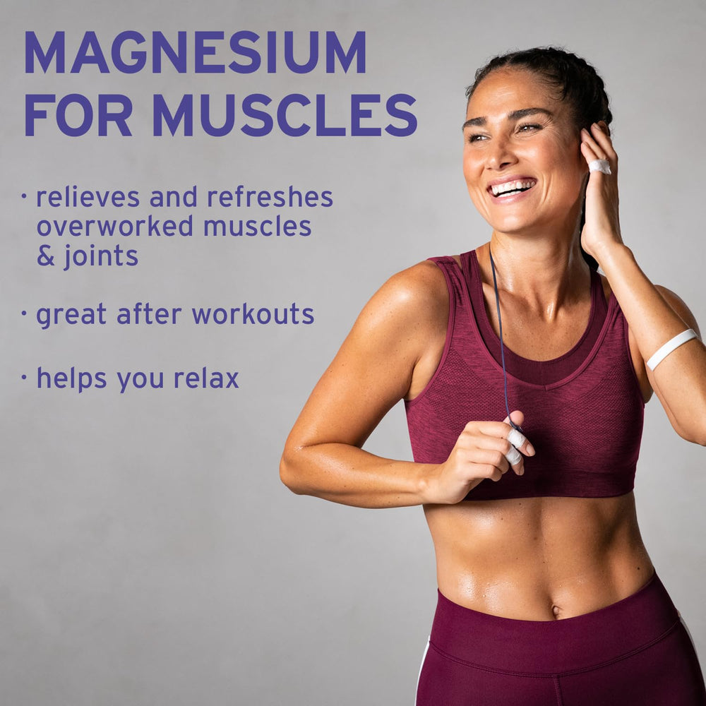 Applying magnesium oil spray to the skin on the forearm