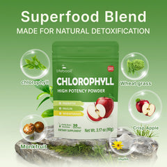 Glass of green chlorophyll drink on a clean surface