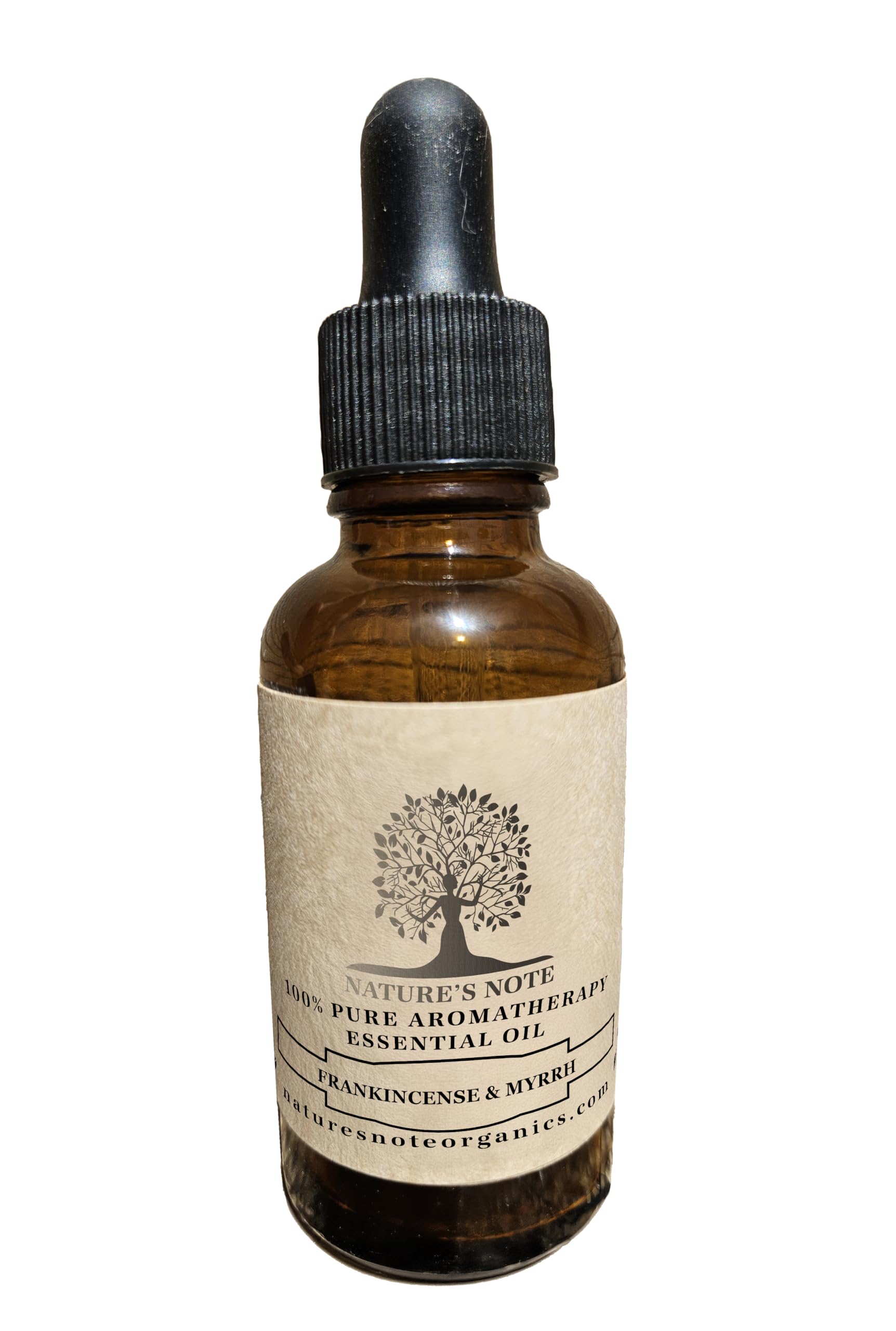 Lifestyle image with diffuser and natural decor featuring Frankincense & Myrrh.