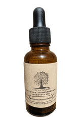 Lifestyle image with diffuser and natural decor featuring Frankincense & Myrrh.