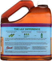 Pouring Lily of the Desert Aloe Vera Juice into a glass