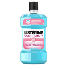 Front view of Listerine Gum Therapy Glacier Mint 1 L bottle in a 3-pack