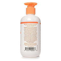 Little Twig Tangerine Shampoo bottle on a shower shelf