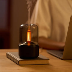 Compact black aromatherapy diffuser suitable for home and office