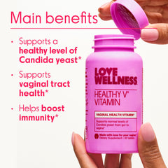 Love Wellness Good Girl Probiotics capsules closeup; vegan, easy-to-swallow.