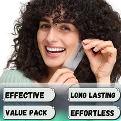 Lower whitening strip being applied to teeth