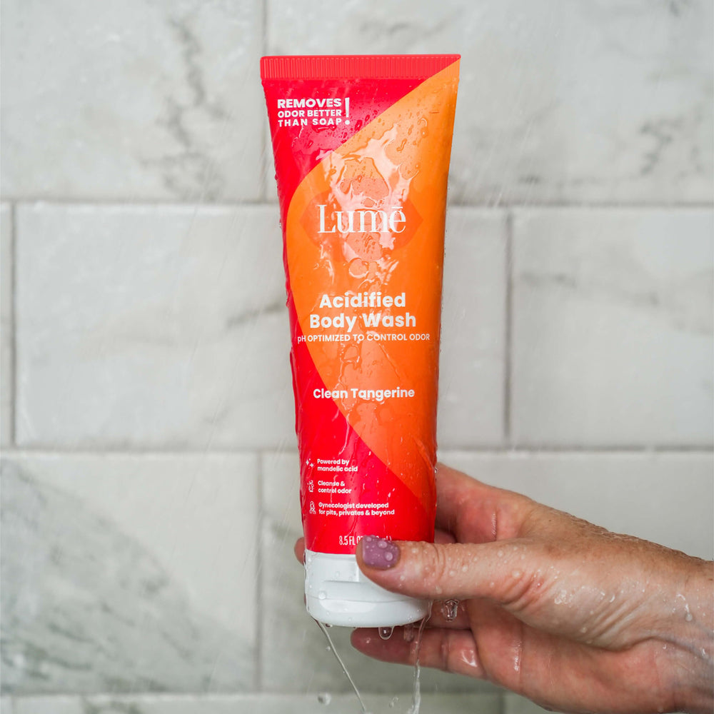 Lume Acidified Body Wash shower scene suggests quick post-shower odor control.