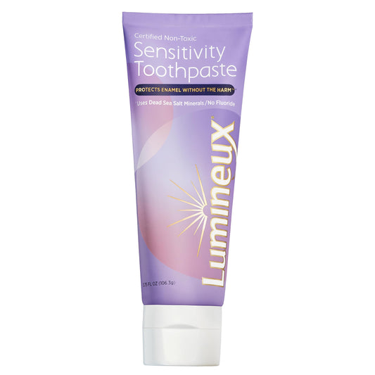 Lumineux Sensitivity Toothpaste tube with mint leaves