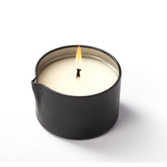 Travel-friendly massage candle with spout and lid