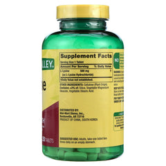 L-Lysine 500 mg tablets being poured from bottle