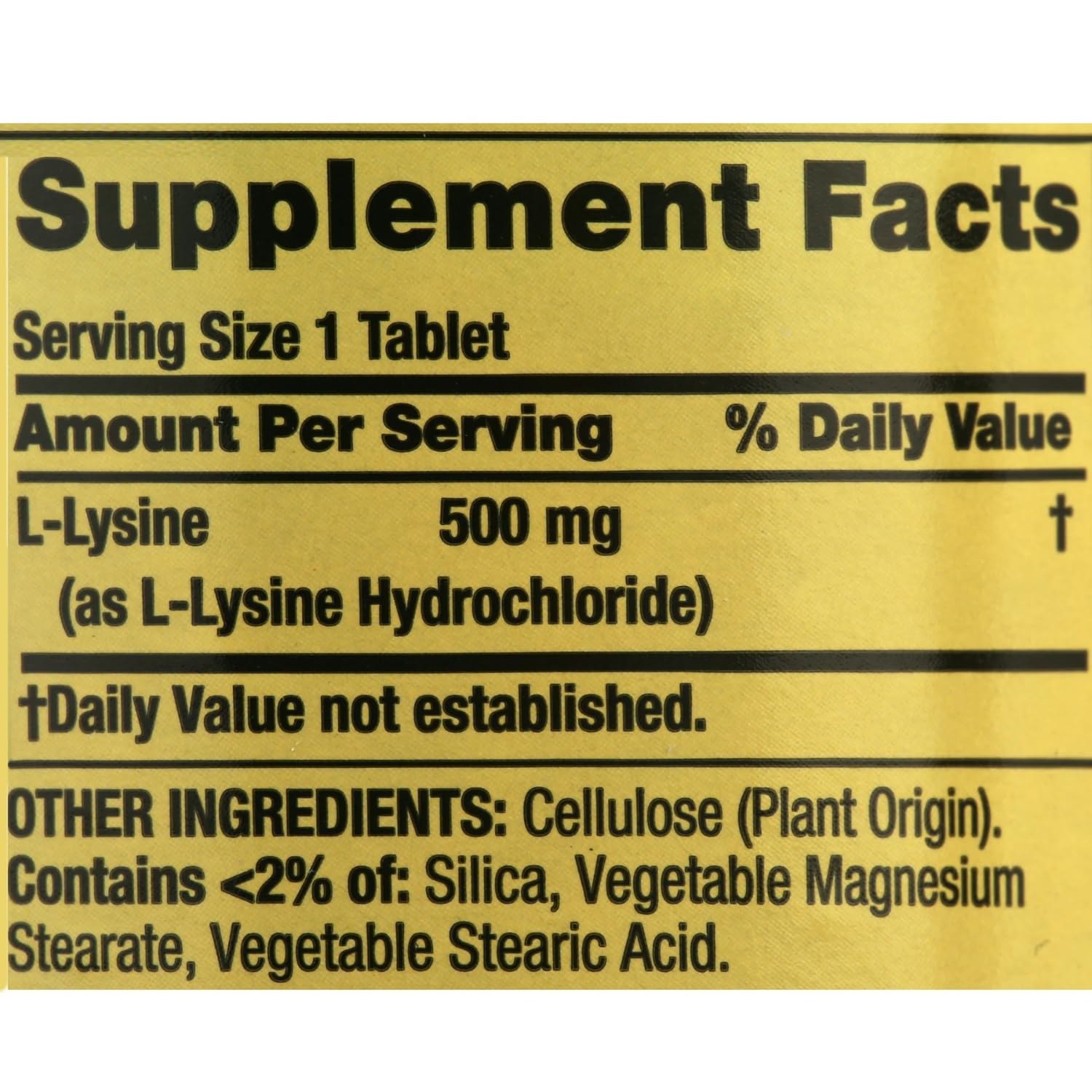 Product packaging of L-Lysine 500 mg tablets on a white surface