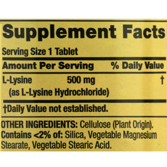 Product packaging of L-Lysine 500 mg tablets on a white surface