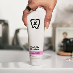 Front packaging of Made by Dentists Sensitive + Whitening Toothpaste