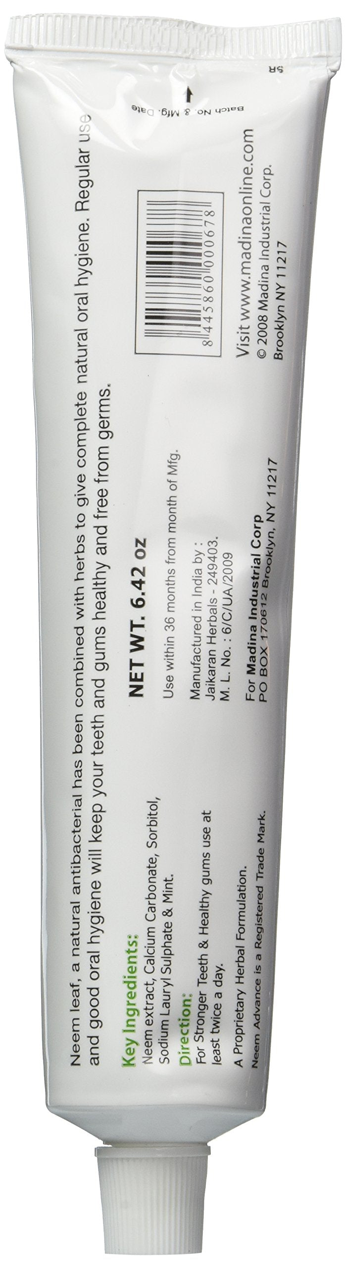 Close-up of Neem leaf and mint imagery on toothpaste packaging
