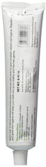 Close-up of Neem leaf and mint imagery on toothpaste packaging