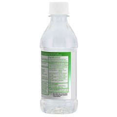 Pouring lemon-flavored Magnesium Citrate Solution into a glass