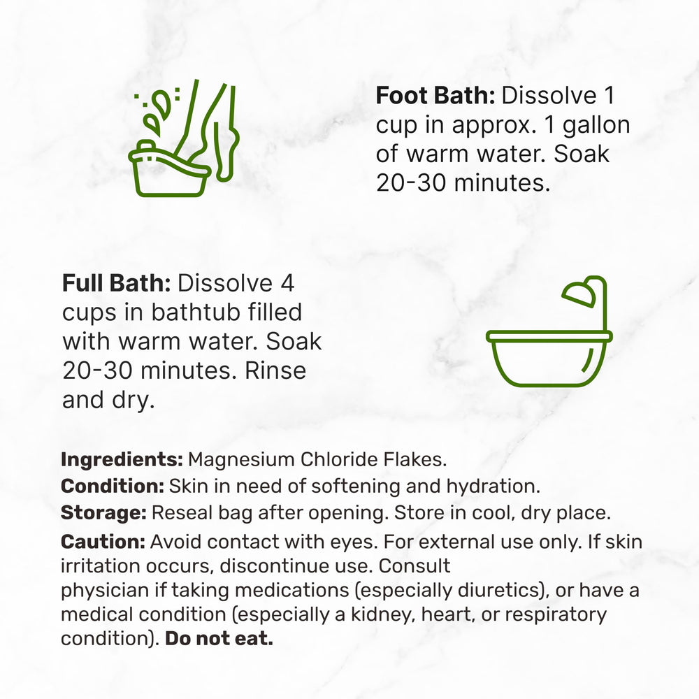 Foot bath with magnesium flakes dissolving in warm water