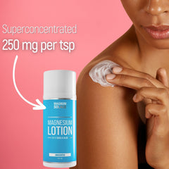 Hands applying magnesium lotion to leg
