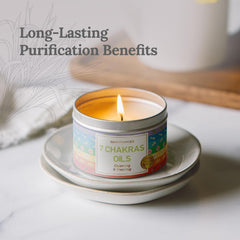Close-up of chakra oils including rosewood lemongrass ginger rose chamomile orange and clove on candle