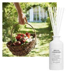 Close-up of REPLICA label on the Garden Diffuser bottle