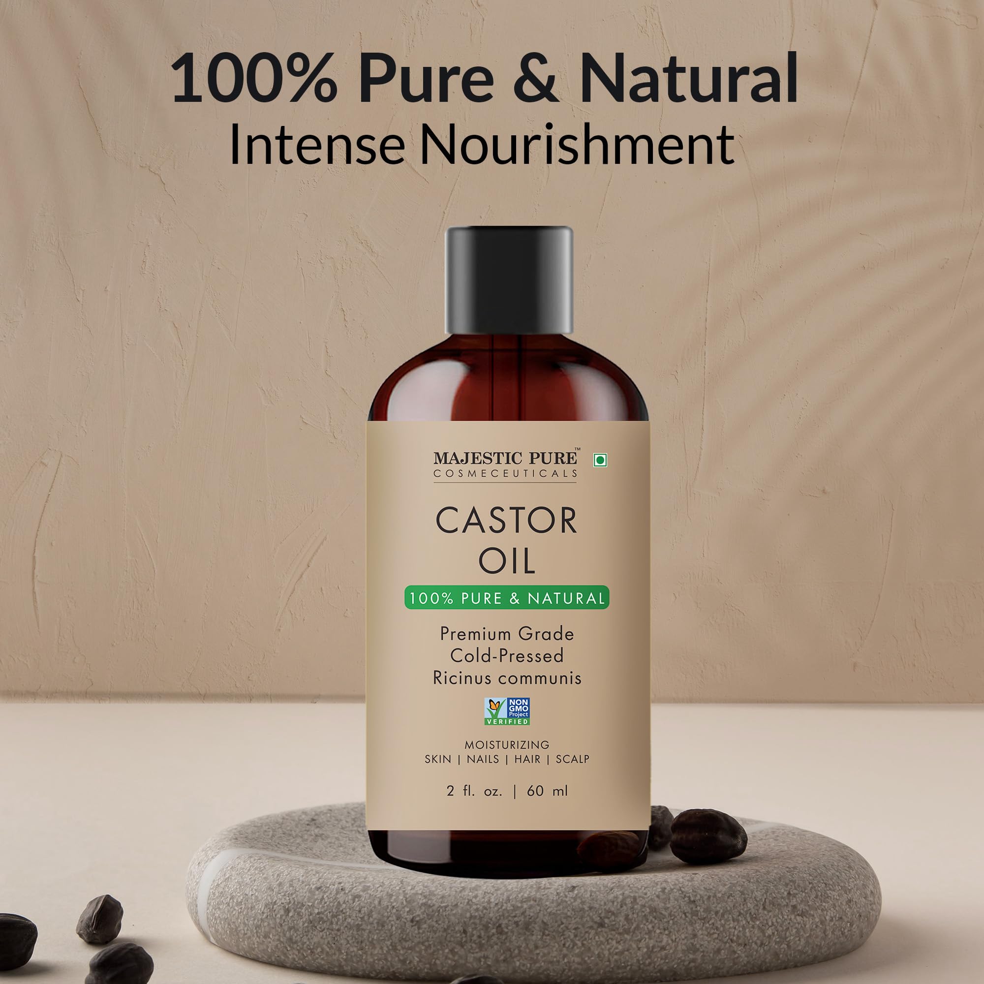 Translucent pale yellow castor oil inside a clear bottle