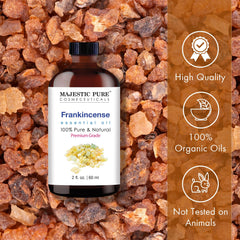 Majestic Pure Frankincense Oil in amber bottle on white background