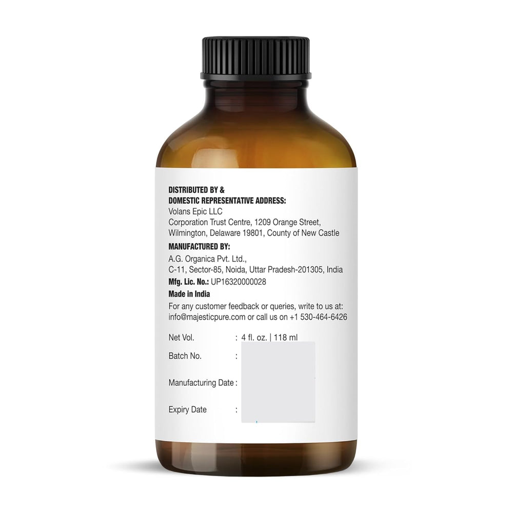 Close-up of amber glass bottle of Majestic Pure Lemongrass oil