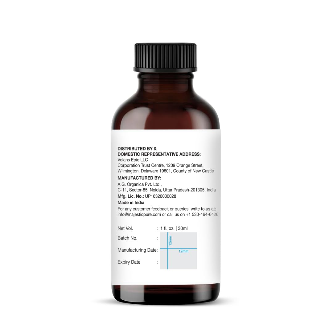 Front close-up of Majestic Pure orange essential oil bottle