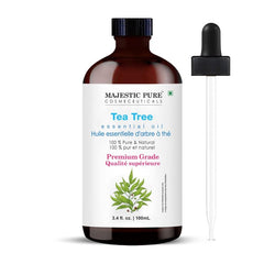 Amber glass bottle of Majestic Pure Tea Tree Essential Oil with dropper