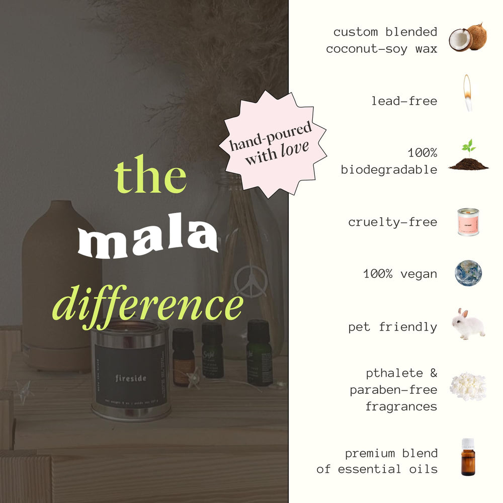 Mala Fireside candle burning with woodwick