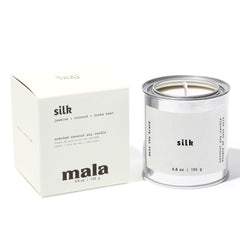 6.8 oz MALA scented candle in glass jar with Tonka Bean Jasmine & Coconut fragrance