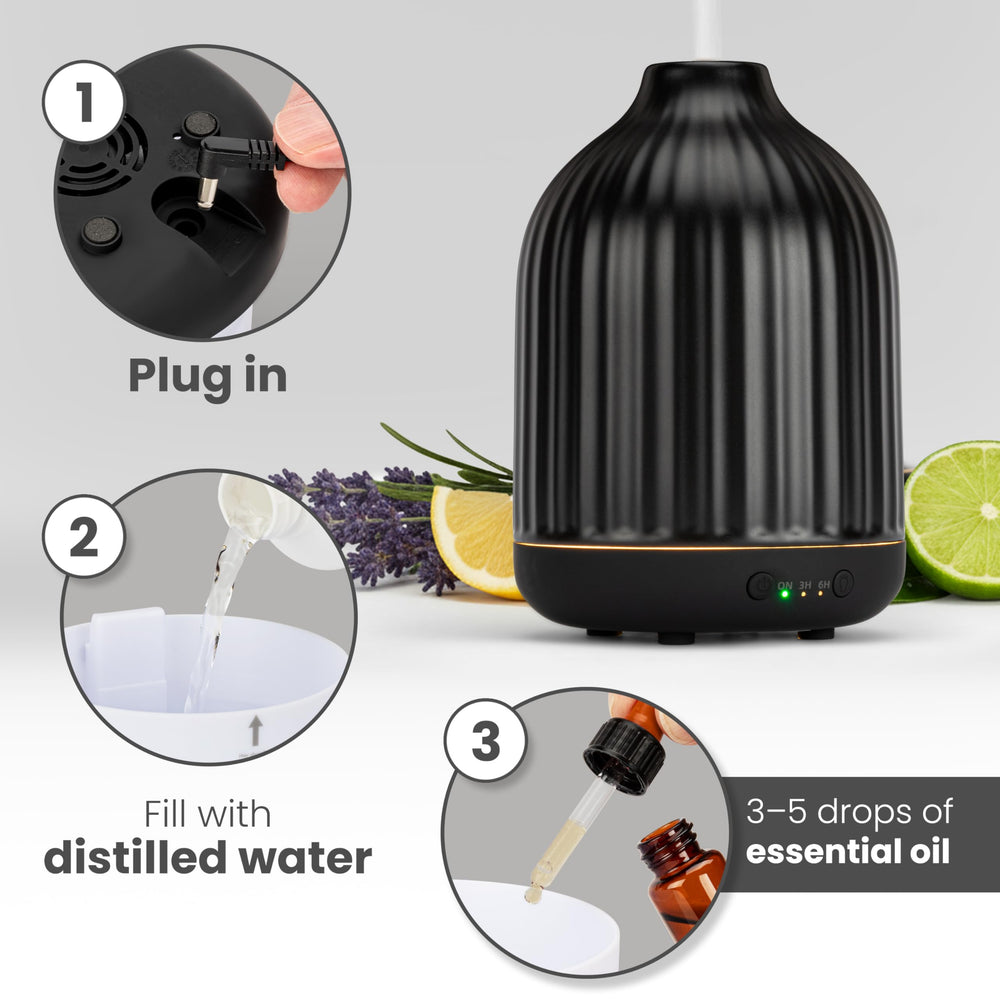 MALMØ 250ml ceramic diffuser emitting a gentle mist