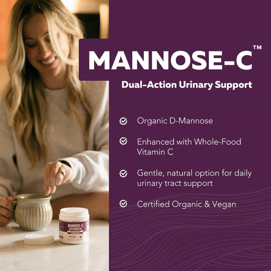 Close-up of Mannose-C powder measuring scoop