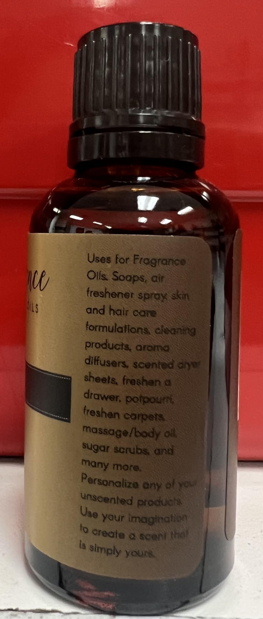 Close-up of Maple Pecan fragrance oil liquid in amber bottle
