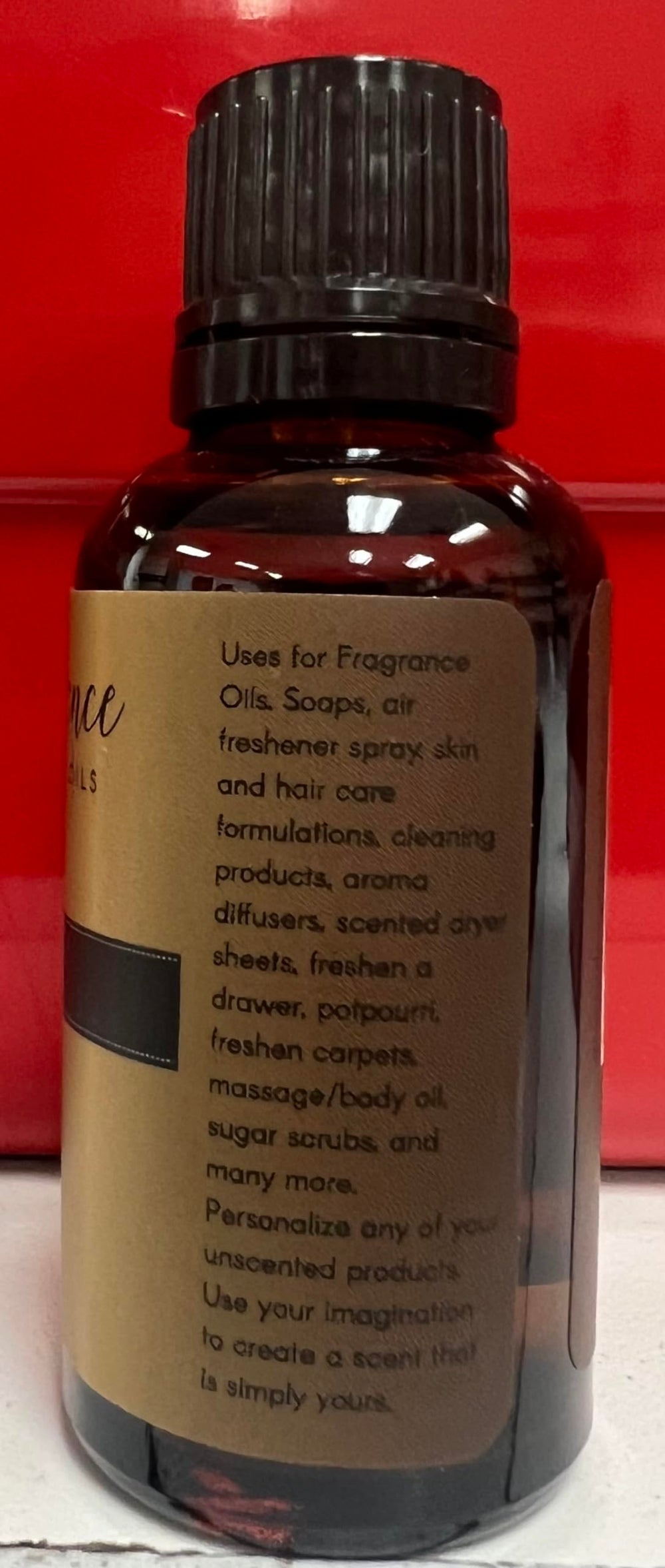 Close-up of Maple Pecan fragrance oil liquid in amber bottle