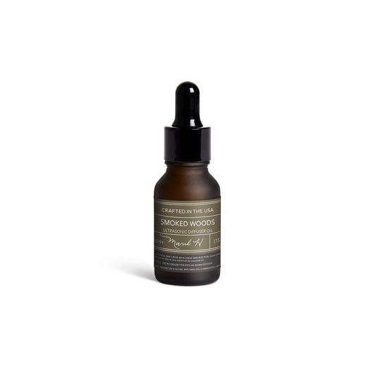 MARIL Smoked Woods diffuser bottle delivering room-filling aroma.