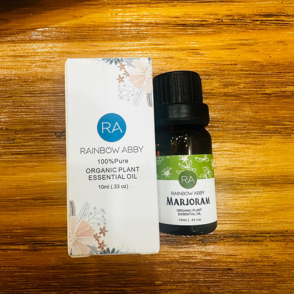 Close-up of Rainbow Abby marjoram essential oil bottle label