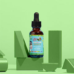 Dropper dispensing probiotic drops into glass
