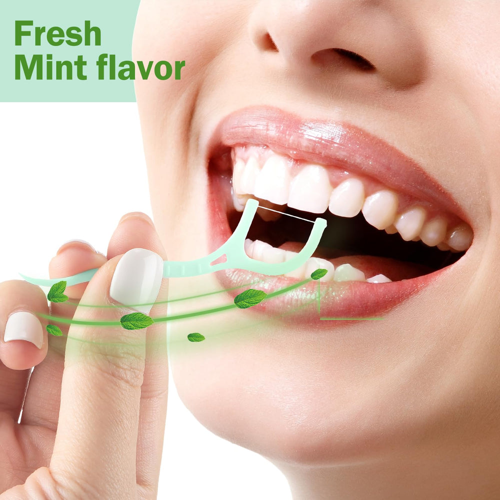 Mint green floss picks arranged in bulk