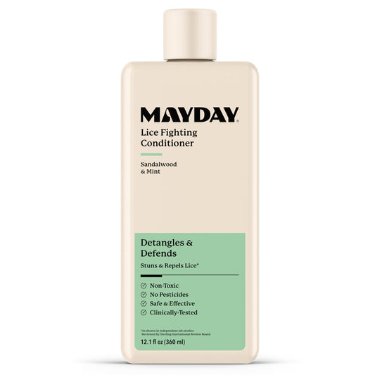 MAYDAY Lice Fighting Conditioner sandalwood-mint bottle pour shows non-toxic lice defense and detangling.