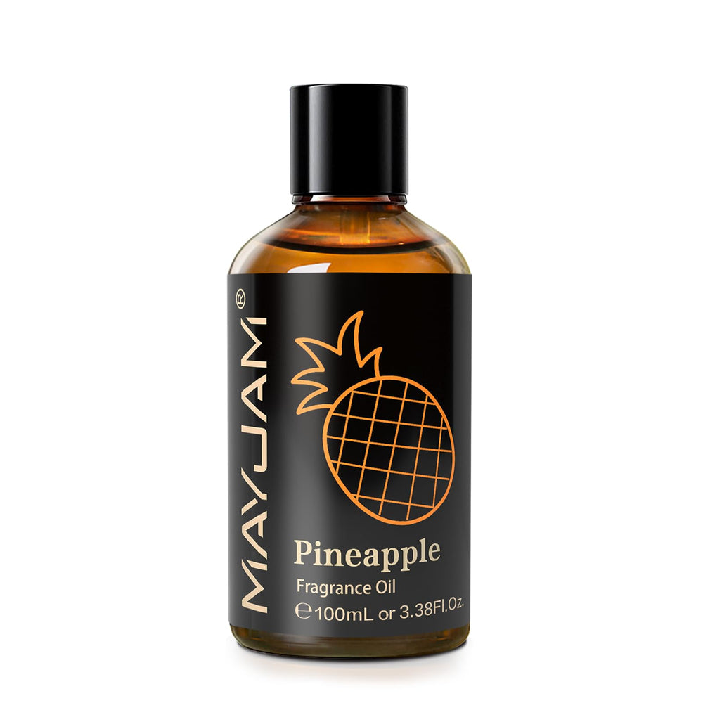 Close-up of MAYJAM Pineapple fragrance oil bottle with amber glass