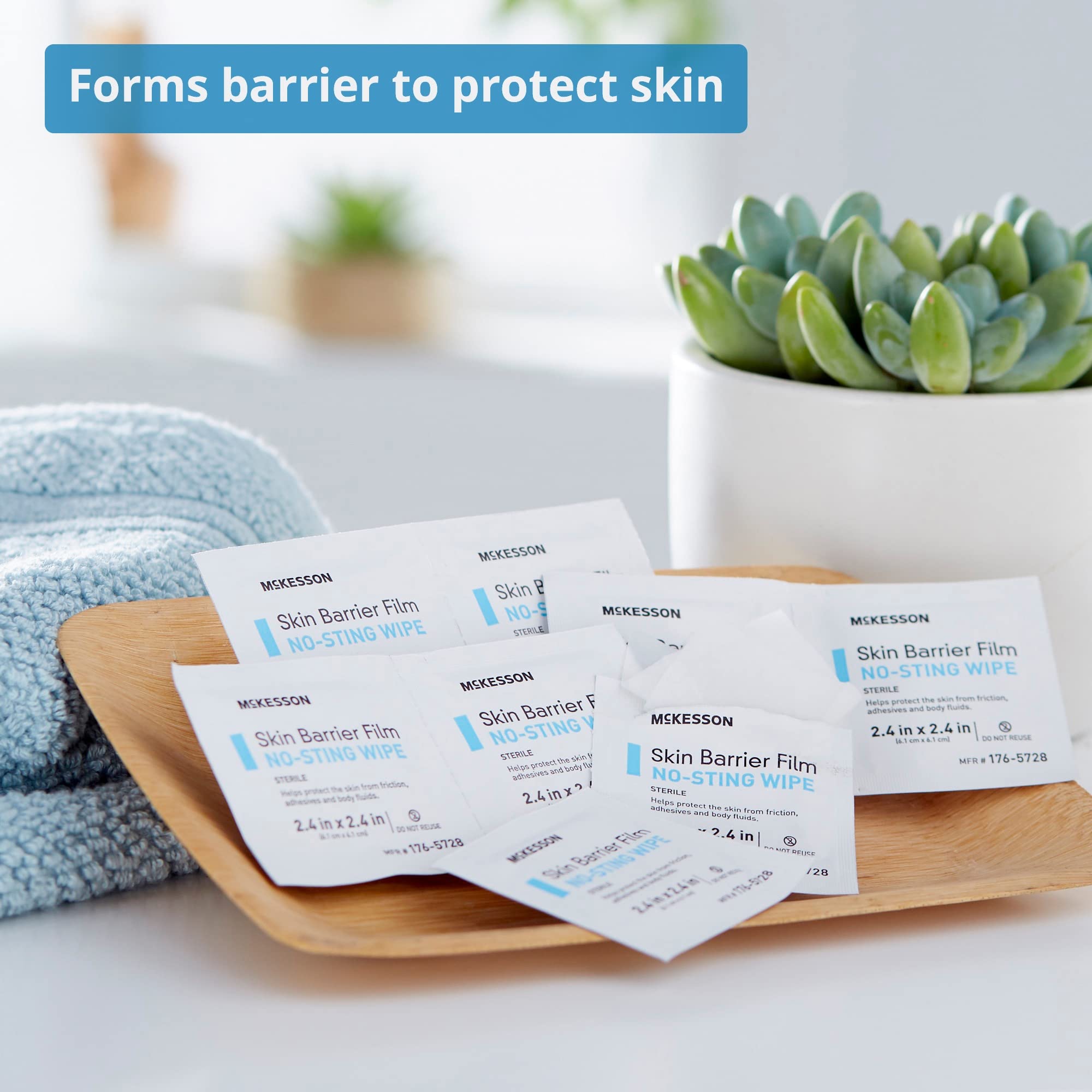 McKesson Skin Barrier Film wipe being applied to skin before adhesive attachment.