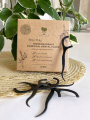 Plastic-free packaging for vegan dental floss picks