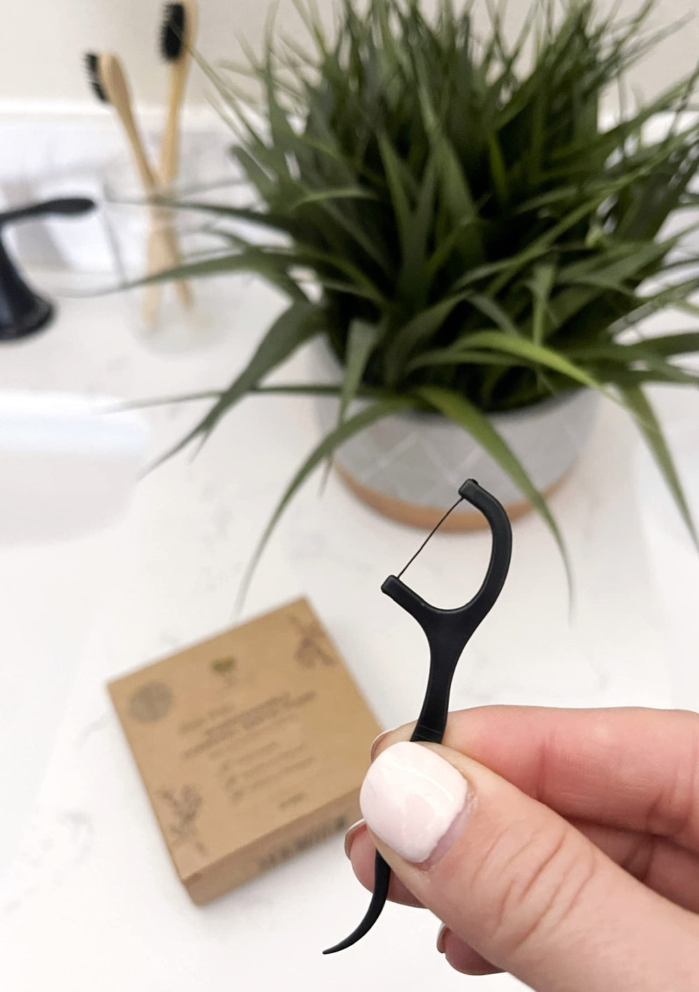 Three-inch bamboo charcoal dental floss picks