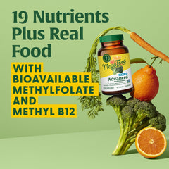 Real food concept with broccoli, carrots, and oranges