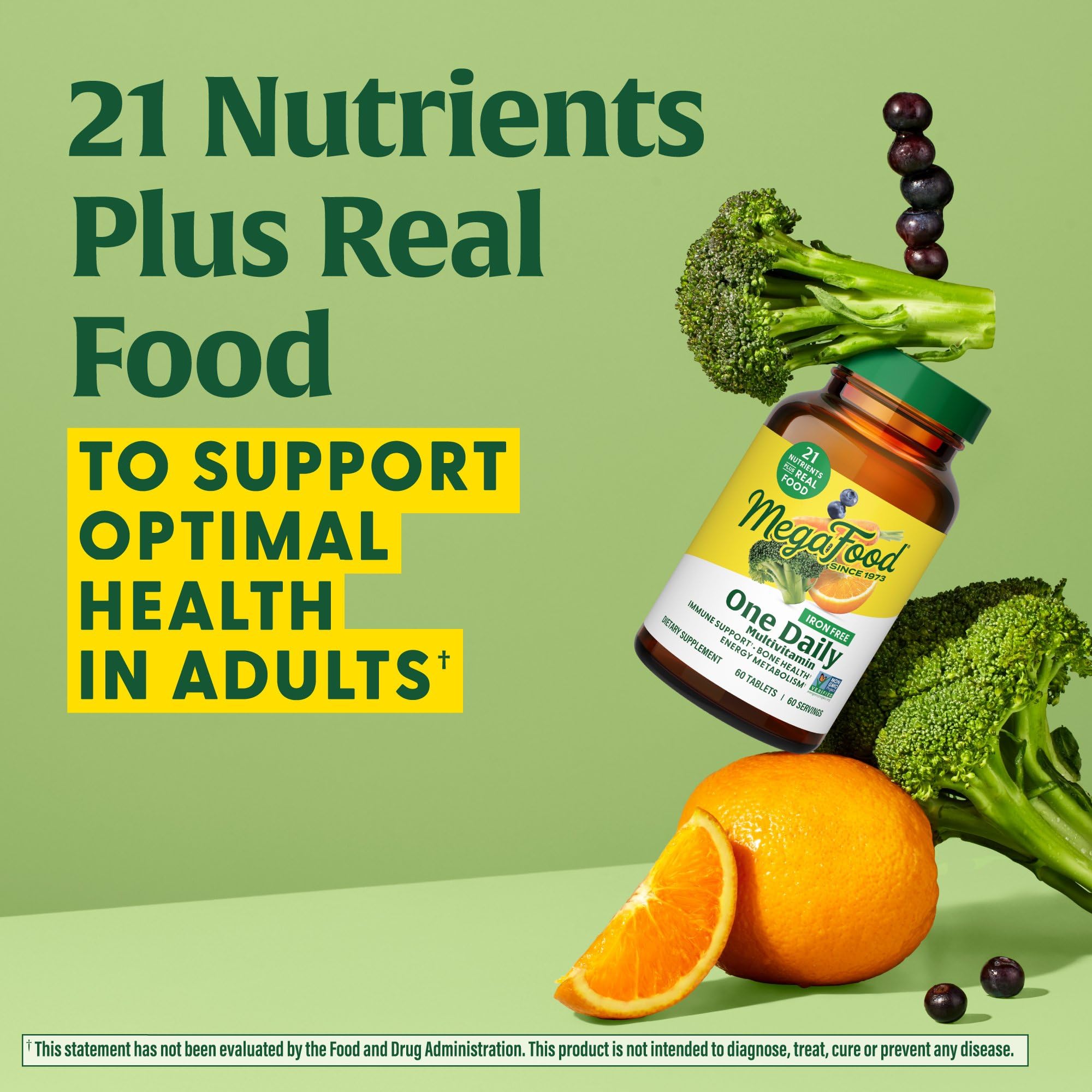 MegaFood One Daily Iron Free tablets arranged with a glass of water for easy daily use.